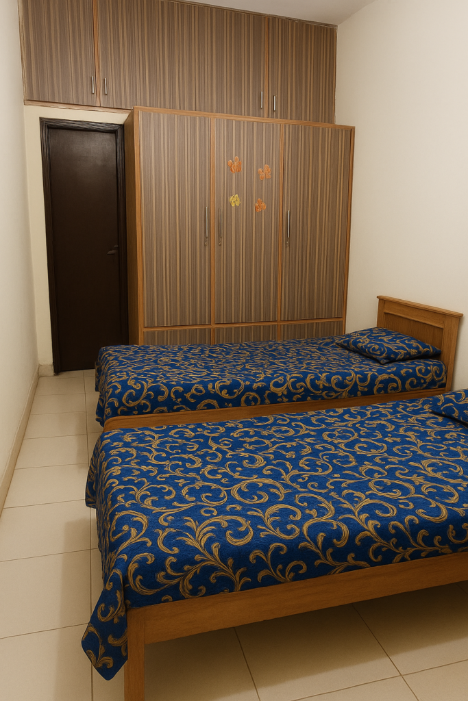 Clean and furnished room at Al-Nisa Homes Girls Hostel Lahore
